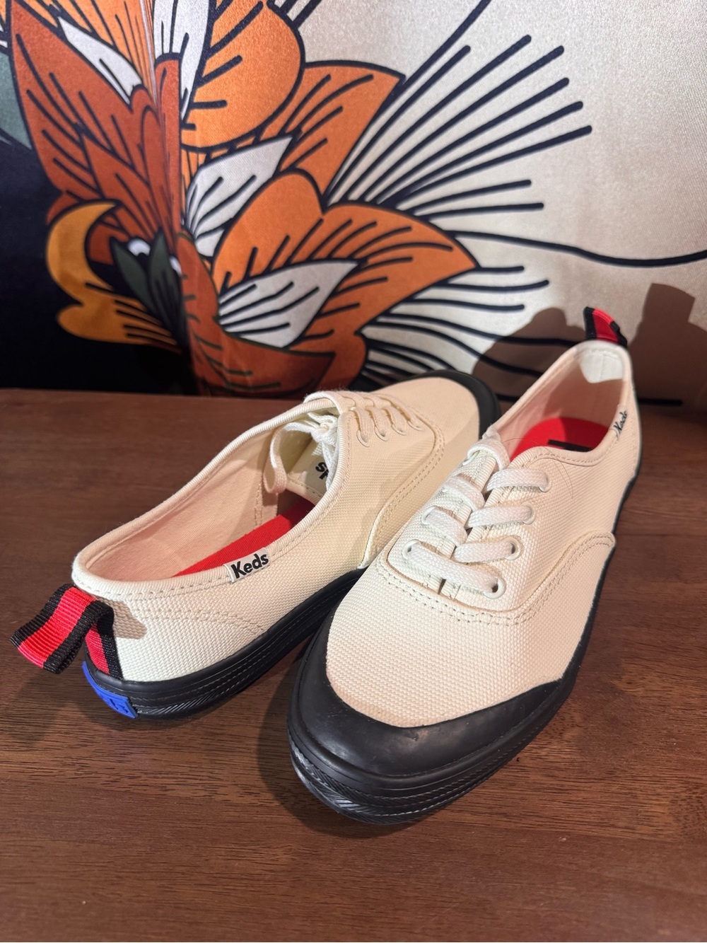 Keds White Canvas Lace-Up Sneakers with Black Trim and Red Insoles